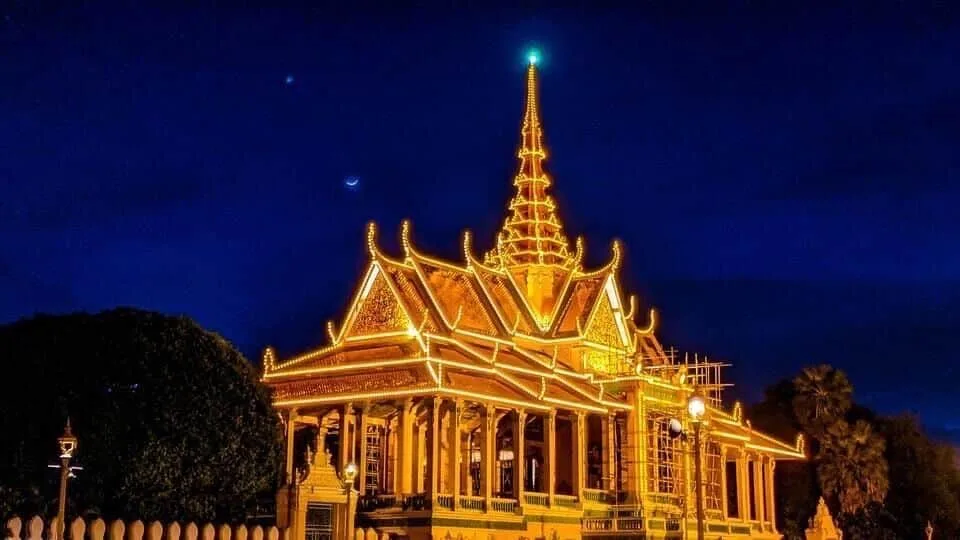The Royal Palace in Phnom Penh illuminated in gold at night